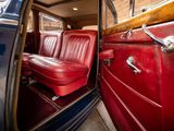 a red leather seat in the back of a blue car