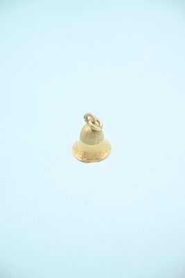 an image of a gold bell on a blue background