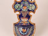 an image of a decorative vase with a cross on it
