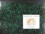 une photo d'un sac vert et noir sur lequel est collé un autocollant