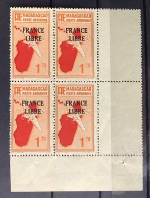 four stamps with a map of france on them sitting on a table