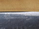 a close up of a knife on a table