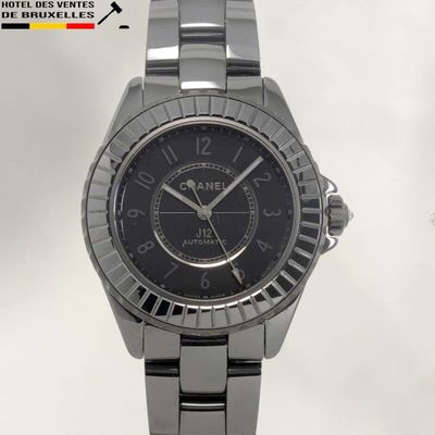 an image of a close up of a wrist watch on a white background