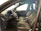 the interior of a car with a dashboard and a steering wheel