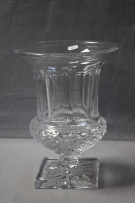 a glass vase that is sitting on a table
