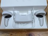 a white box with a pair of airpods inside of it