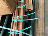 many pieces of wood that are sitting on a pallet