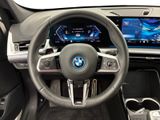 the interior of a car with a steering wheel and dashboard