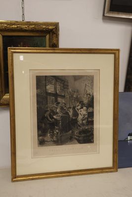 a picture of a man sitting at a table in front of a picture of a man
