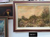 many paintings hanging on the wall next to each other