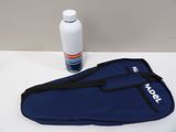 a bottle of water and a blue bag on a table