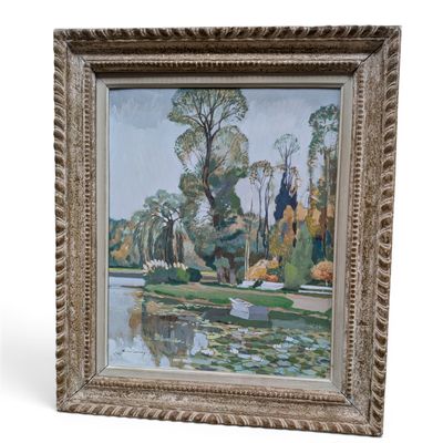 une image représentant un tableau représentant un lac et des arbres, dans un cadre