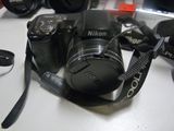 a camera that is sitting on a table next to other cameras
