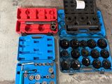 two blue and one red plastic case with wheels and wrens
