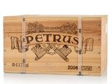 a wooden box that has a bottle of wine inside of it