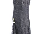 black lace dress on a mannequin stand with a black purse