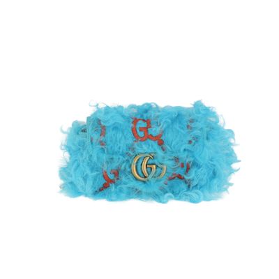 pochette à plumes turquoise avec boucle GG dorée