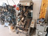 many machines that are sitting in a room
