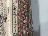 a close up view of a rug with an oriental design on it