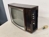 a small television sitting on top of a table