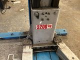 a close up of a machine that is sitting on the ground