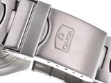 a close up of a watch on a white surface