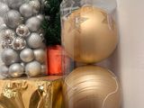 many christmas balls and ornaments in a clear bag