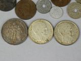 a lot of coins that are on the table