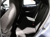 a seat in the back of a car with the door open