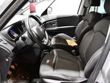 the interior of a car with a steering wheel and a dash board
