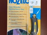 a close up of a package of hoses with a dog on a leash