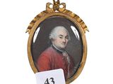 portrait d'un homme en manteau rouge, dans un cadre doré