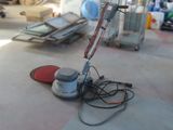 a machine that is sitting on the floor in a room