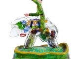 figurine of a man riding a horse on a green and yellow base