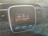 the dashboard of a car with a digital display in the center