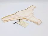 a close up of a white underwear with a tag on it