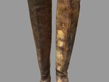 an image of a pair of boots that are on a gray surface