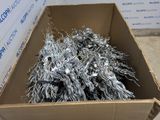 a cardboard box filled with lots of scrap metal