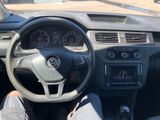 dashboard of a car with a person sitting in the drivers seat