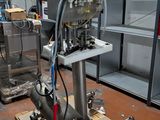 a machine that is sitting on a pallet in a warehouse