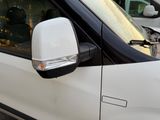 a white van parked on the side of the road