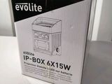 the box is open on a white table with a black and white logo