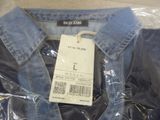 a picture of a blue jean jacket with a price tag on it