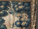 an image of a tapestry hanging on a wall in a room