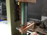 a picture of a machine that is working on a piece of wood
