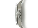 an image of a close up of a watch on a white surface