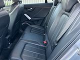 the back seats of a car are empty in the back of the car