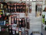 many different types of hair hanging on the wall