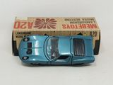 a toy car that is sitting in front of a box
