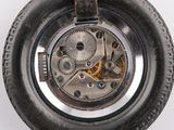 a close up view of a watch with a metal case